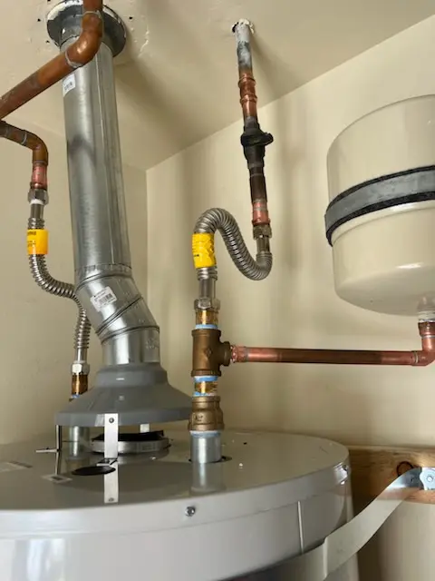 Water heater installation and plumbing repair in West Seventh