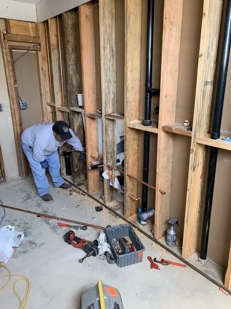 Commercial rough-in plumbing for Water Heater Replacement in West Seventh
